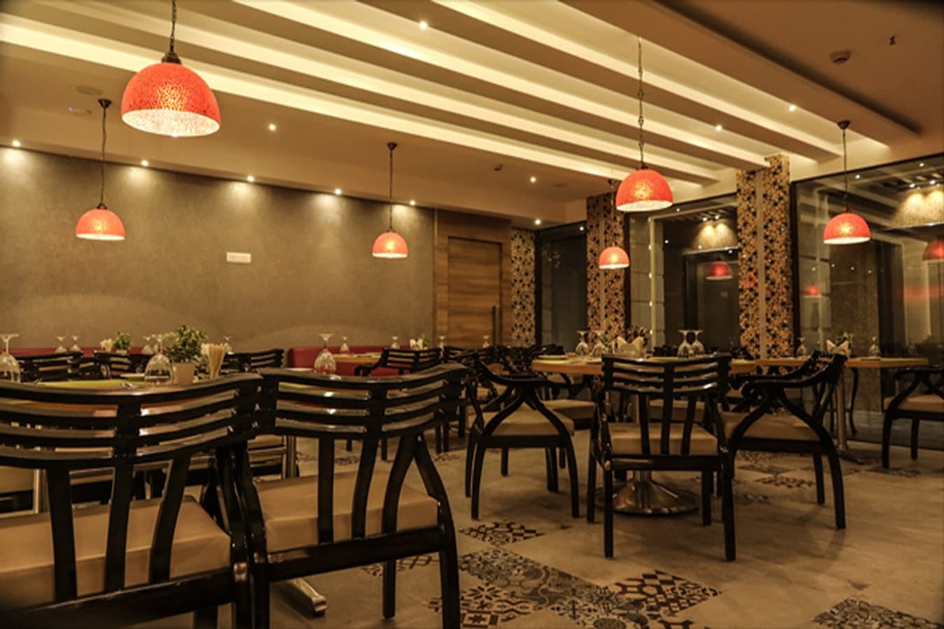 Aroma under its red glass lamps